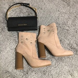 Pink suede heeled boots